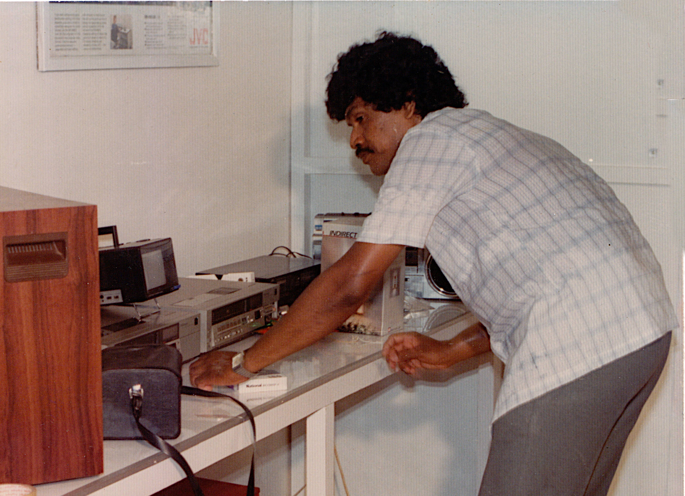 EXPO Wijayavarman is editing videos.
